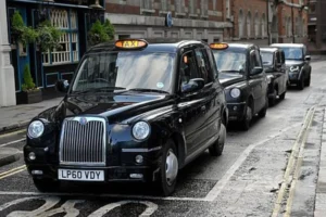 how much would a taxi cost for 20 miles uk_